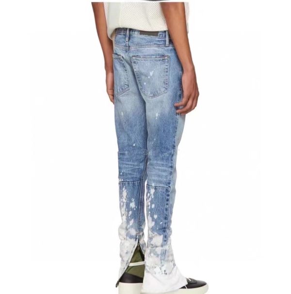 FEAR OF GOD FOG WASHED DISTRESSED BLUE AND WHITE INK SPLASH SLIM FIT ZIPPERED HIGH STREET JEANS