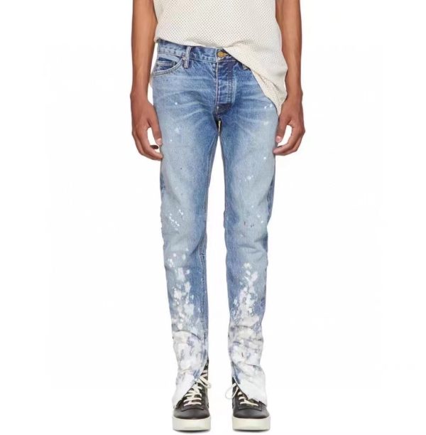 FEAR OF GOD FOG WASHED DISTRESSED BLUE AND WHITE INK SPLASH SLIM FIT ZIPPERED HIGH STREET JEANS